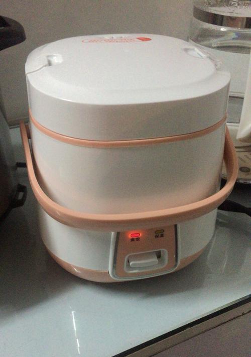 解决电饭煲煮出硬饭的方法（探索电饭煲煮饭硬的原因及解决方案）