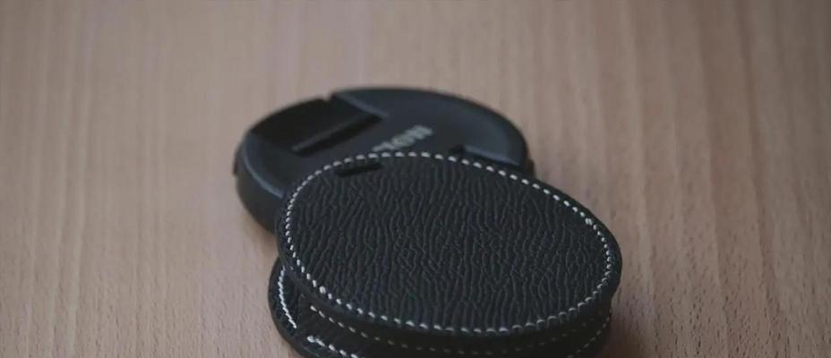 相机镜头保护盖挂绳的拆卸方法是什么？